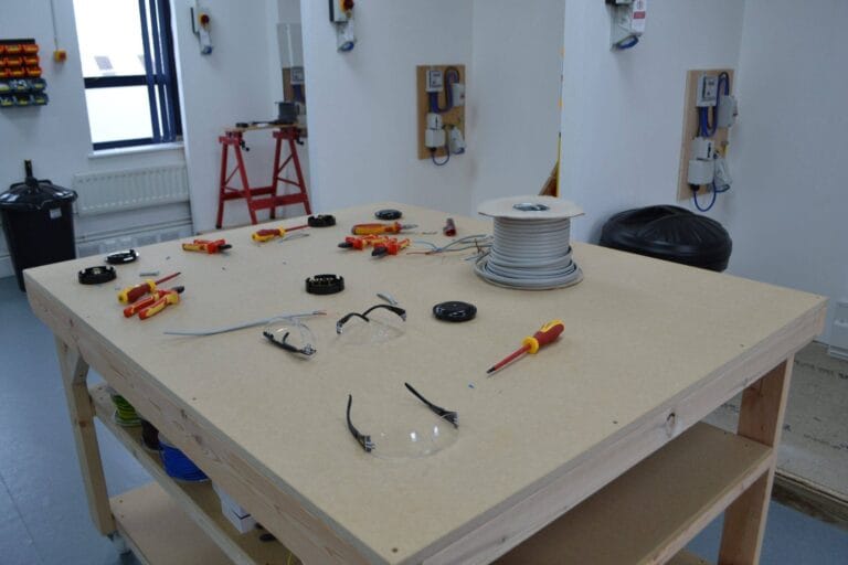 Electrical tools displayed on the training bench